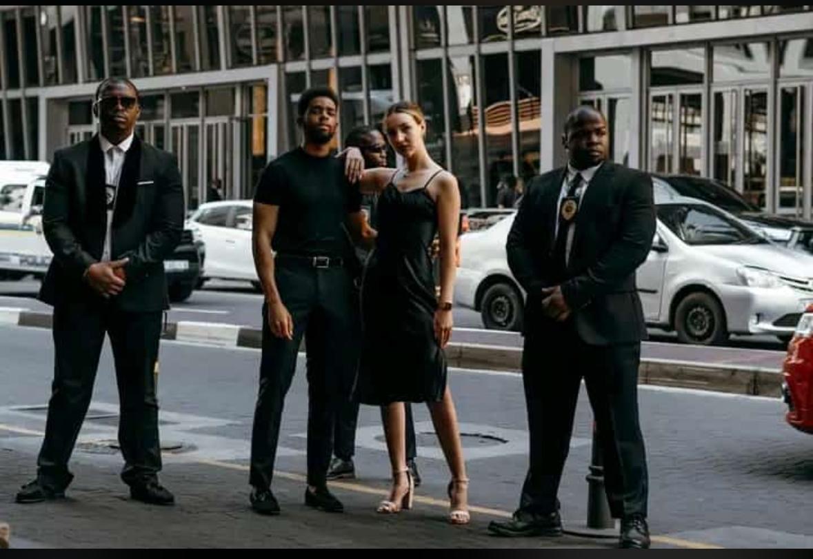 KM VIP close protection detail escorting VIP principal through Johannesburg CBD